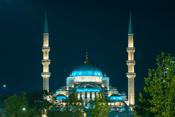 Eminonu Yeni Cami or New Mosque view at night. Ramadan or islamic concept