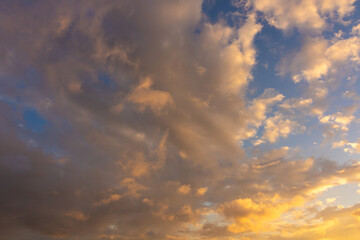 Dramatic sunset background photo. Orange clouds at sunset