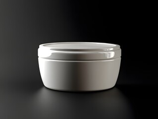 White ceramic bowl on a dark background, showcasing its smooth surface and elegant design