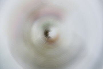 Spiraling colors and shapes creating a mesmerizing illusion in motion