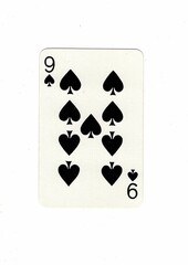 A vintage playing card isolated in the centre of a white background.