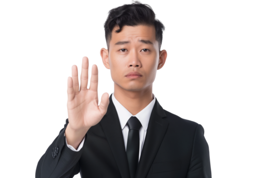 Serious young East Asian male analyst gesturing stop with palm isolated on transparent white background - Powered by Adobe
