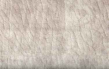 Close up high resolution photo of beige suede leather material texture