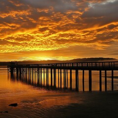 Obraz premium Golden sky over pier in Des Moines.