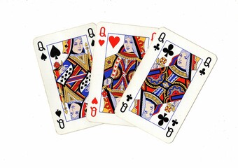 A hand of vintage playing cards isolated on a white background.