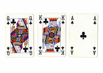A queen, king and ace of clubs playing cards on a white background.