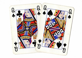 A blackjack or pontoon hand of vintage playing cards isolated on a white background.