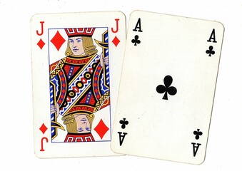 A blackjack or pontoon hand of vintage playing cards isolated on a white background.