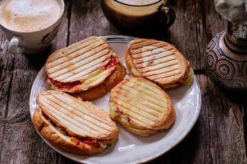 hot sandwiches with cheese and tomatoes