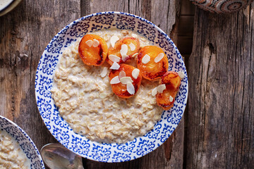 Oatmeal with apricot and almond petals.