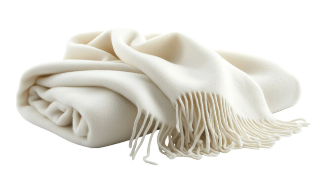 Soft white blanket with fringed edges draped elegantly on a flat surface for cozy warmth and comfort
