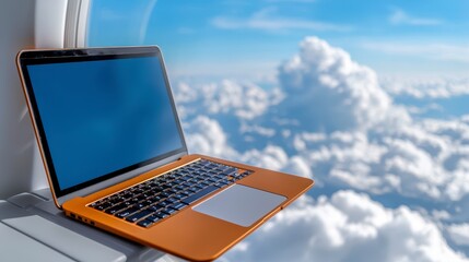 Laptop computer with business travel conference itinerary on a desk for professional planning and organization