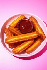 Crispy churros arranged artfully with rich dipping sauce on vibr