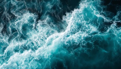Fototapeta premium Turbulent ocean waves with white foam and turquoise waters in motion
