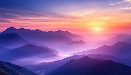 Fototapeta premium A breathtaking sunrise over the mountains, with colorful clouds and mist in the valley below. 