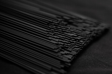 pasta with cuttlefish ink black pasta on a dark background