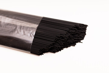 pasta with cuttlefish ink black pasta on a white background