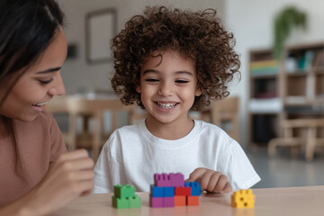 A therapist helping a child with motor skills, encouraging them to stack colorful therapy blocks on a table.