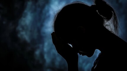 topsellers Silhouette of a person's head against a dark background
