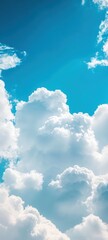 Fototapeta premium Bright blue sky with fluffy white clouds forming stunning shapes