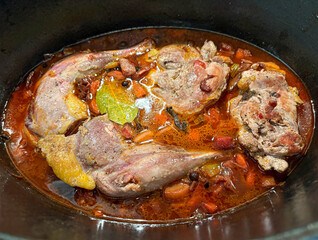 Delicious pheasant meat stewed with vegetables in pot
