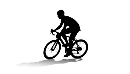 Obraz premium Silhouetted cyclist riding on a plain background