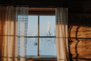 Lapland in the snow, landscapes of pristine snow topped trees and magical golden light in the artic circle. High res photography 
