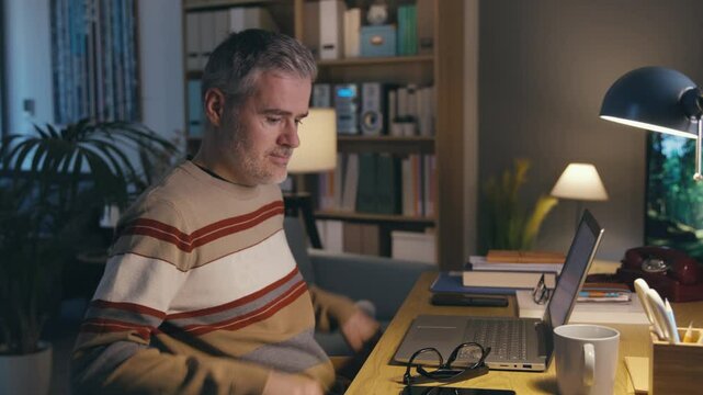 Man working from home at night