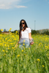 Fototapeta premium beautiful young fashion woman in the nature