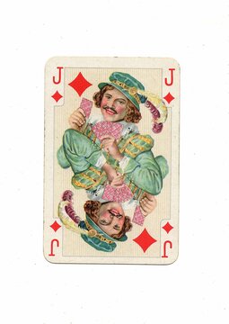 A decorative antique playing card in the suit of clubs.