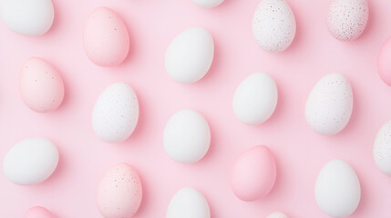 Pale pink and white Easter eggs on a pale pink background, Easter holidays, spring mood