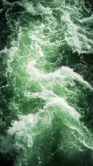Obraz premium Emerald River Rapids Flowing with Turbulent Water and Foaming Waves in a Dynamic Display of Natural Power and Energy