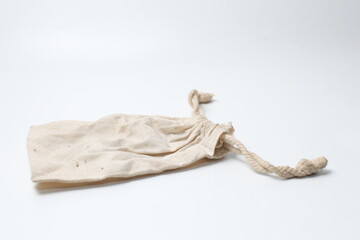 White drawstring bag isolated on white