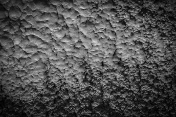 black and white textured concrete wall background
