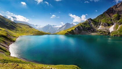 Ritom Lake, Val Piora, Canton Ticino, Switzerland A Serene Alpine Sunset Reflecting on Crystal Clear Waters Amidst the Majestic Swiss Alps, Showcasing a Tranquil Escape in Natures Splendor. © netsay