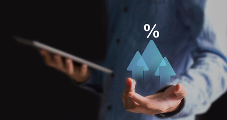 Interest rates and dividends Business development with percentage symbol and up arrow for investment
