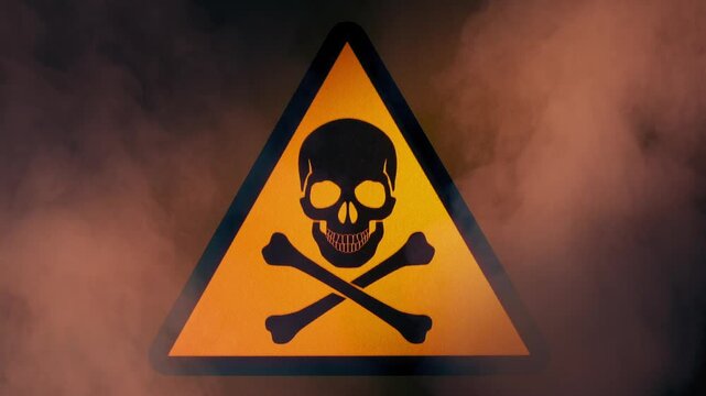 Skull And Bones Warning Sign And Smoke