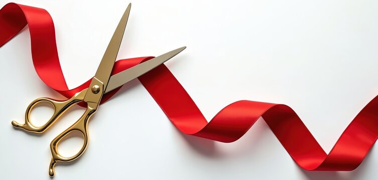 Overhead shot of gold scissors cutting red velvet ribbon on white backdrop. Celebration of grand opening, shop launch, product presentation, new business start, company tradition. Clean invitation
