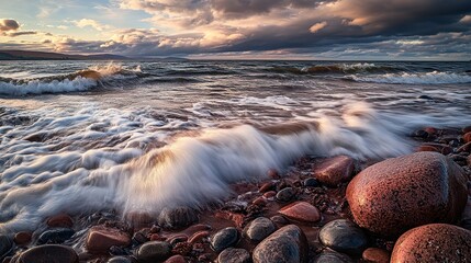 Waves hitting rocks on beach