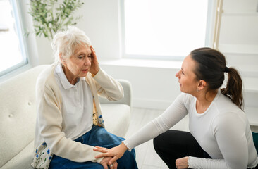 old woman thinking with psychologist in consultation office for mind, evaluation or assessment.