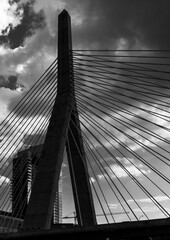 Obraz premium A suspension bridge into the city.