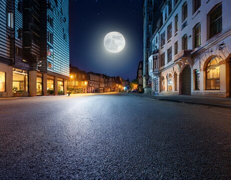 Fototapeta empty city street at night with full moon