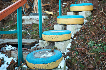 Using car tires as steps by the river