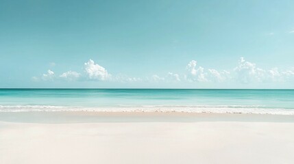 Obraz premium Serene Tropical Beach with Clear Water and Blue Sky Clouds