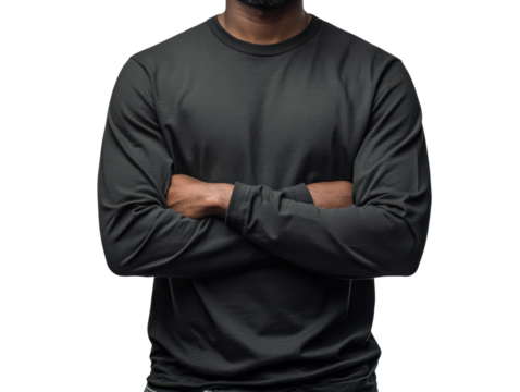 Black long sleeve shirt worn by person with crossed arms, conveying confidence and style
