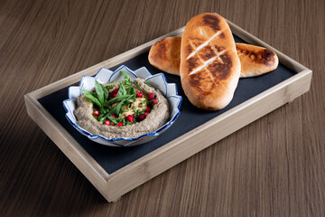 close up view of nice yummy crepes with jam on grey table