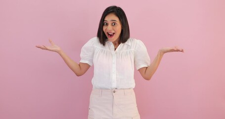 Happy smiling excited surprised shocked beautiful young Indian woman looking at camera
