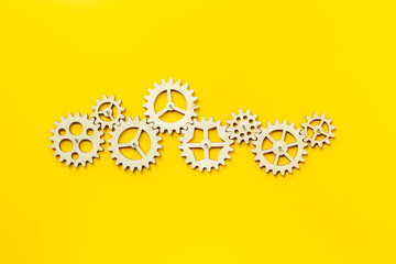 Chain of gears connected together. Corporate work and business process concept