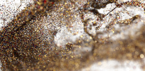 Sparkling gold particles burst. Ideal for luxury, festive designs.