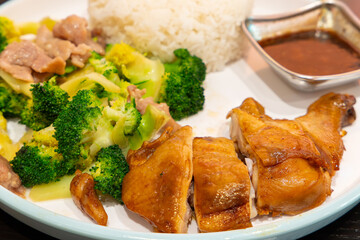 grilled chicken thigh with broccoli and pork and rice